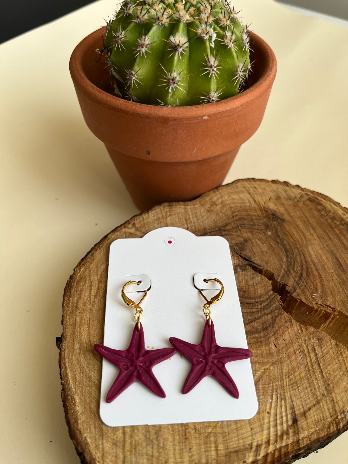 Pendiente Estrella Mar Burdeos