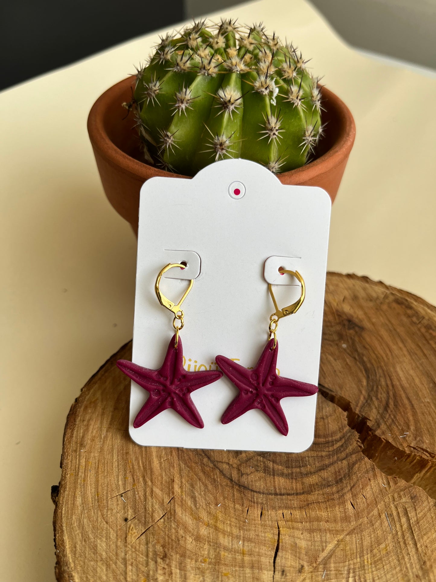 Pendiente Estrella Mar Burdeos