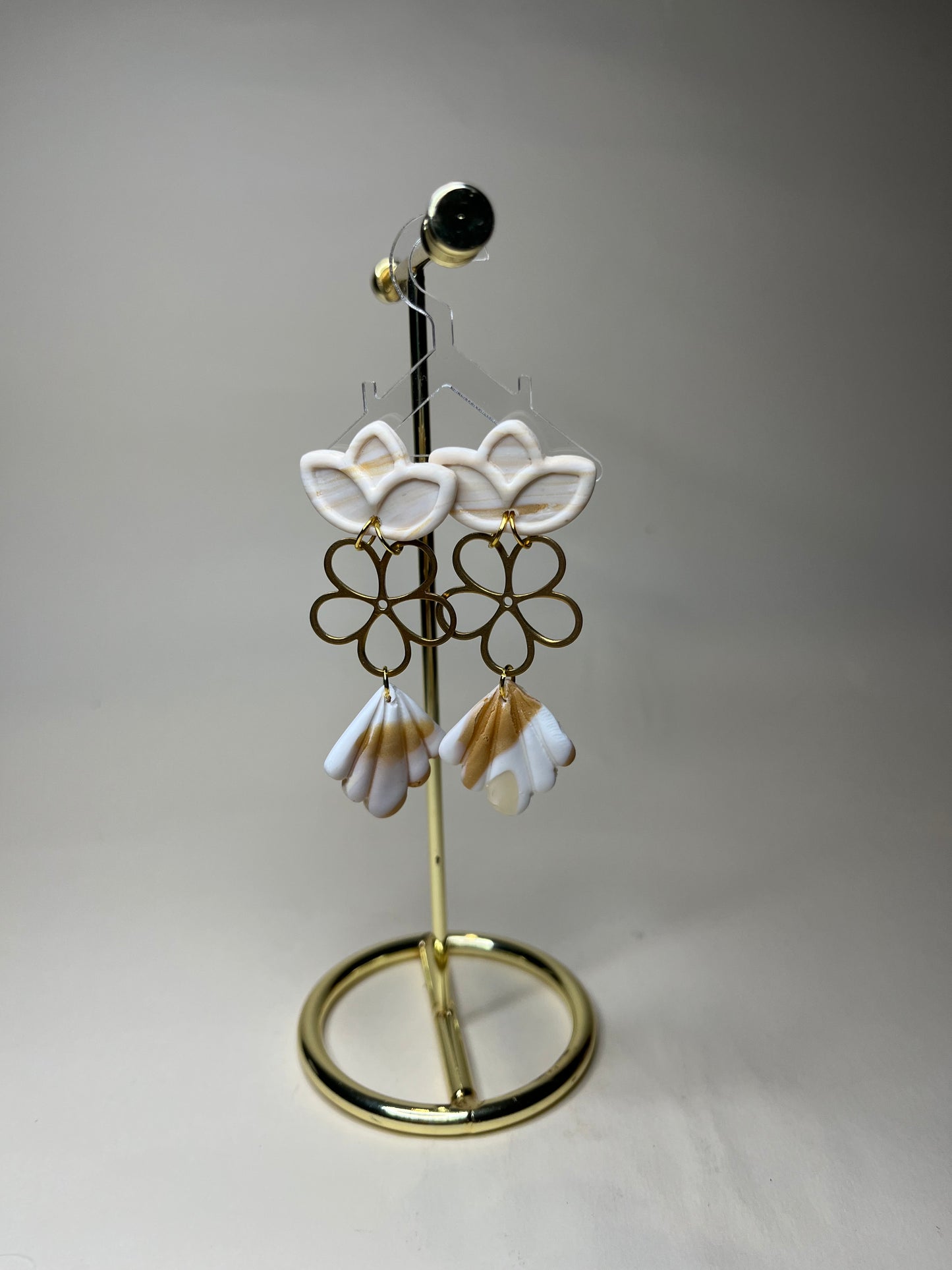 Pendiente Flor de Lis Colección Mármol Tierra