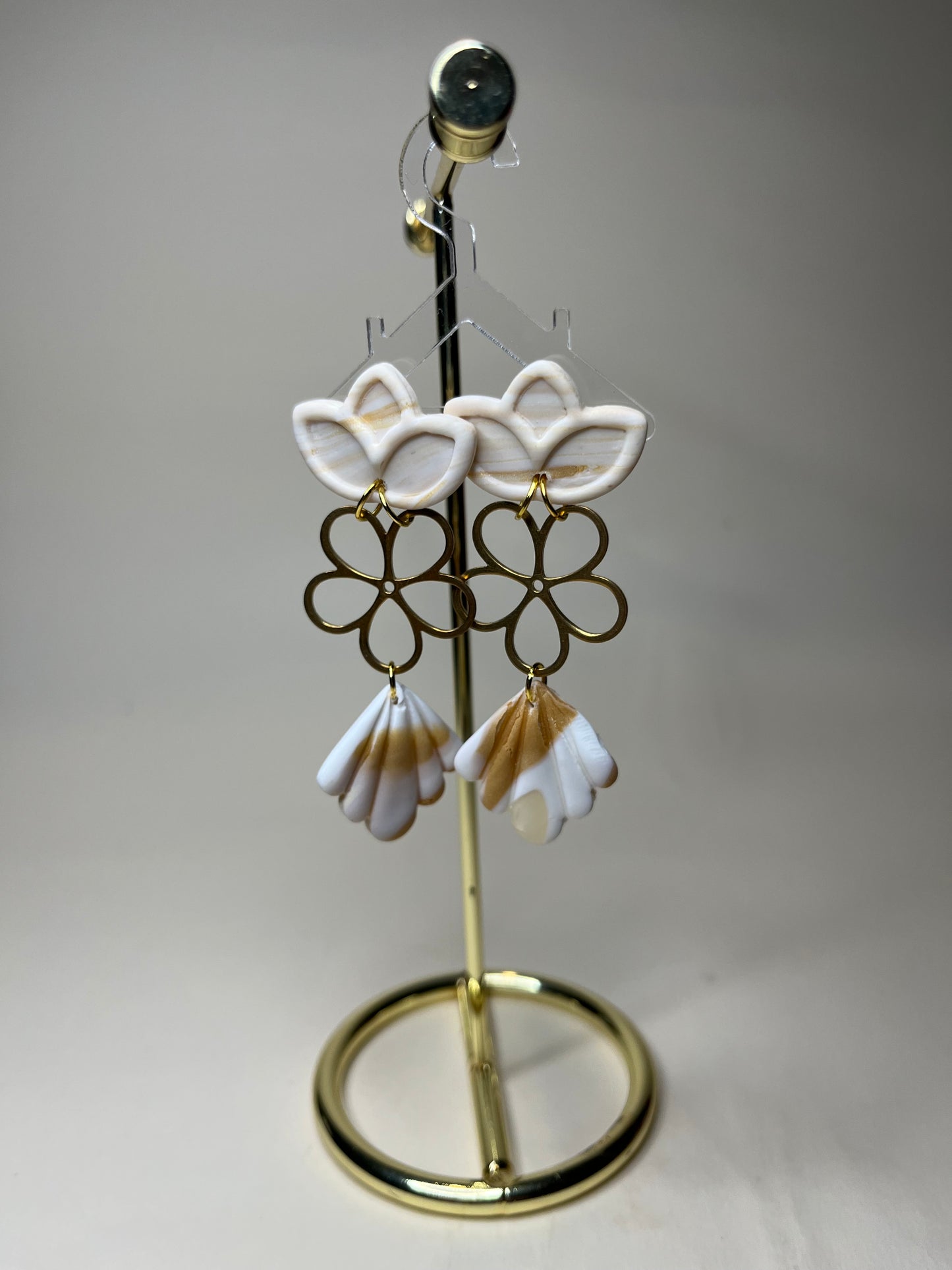 Pendiente Flor de Lis Colección Mármol Tierra